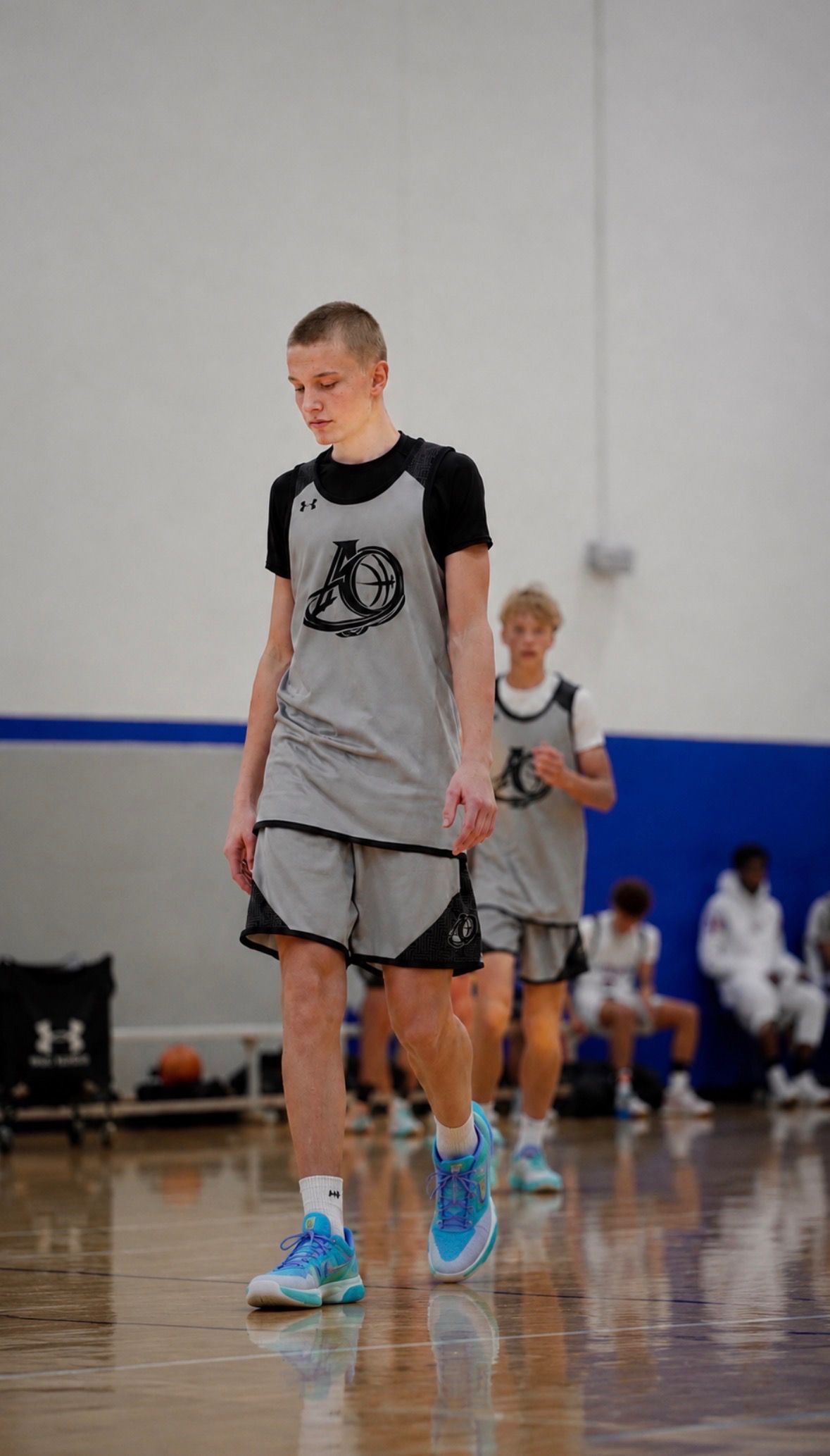 Luke Dellwo on the basketball court during a game